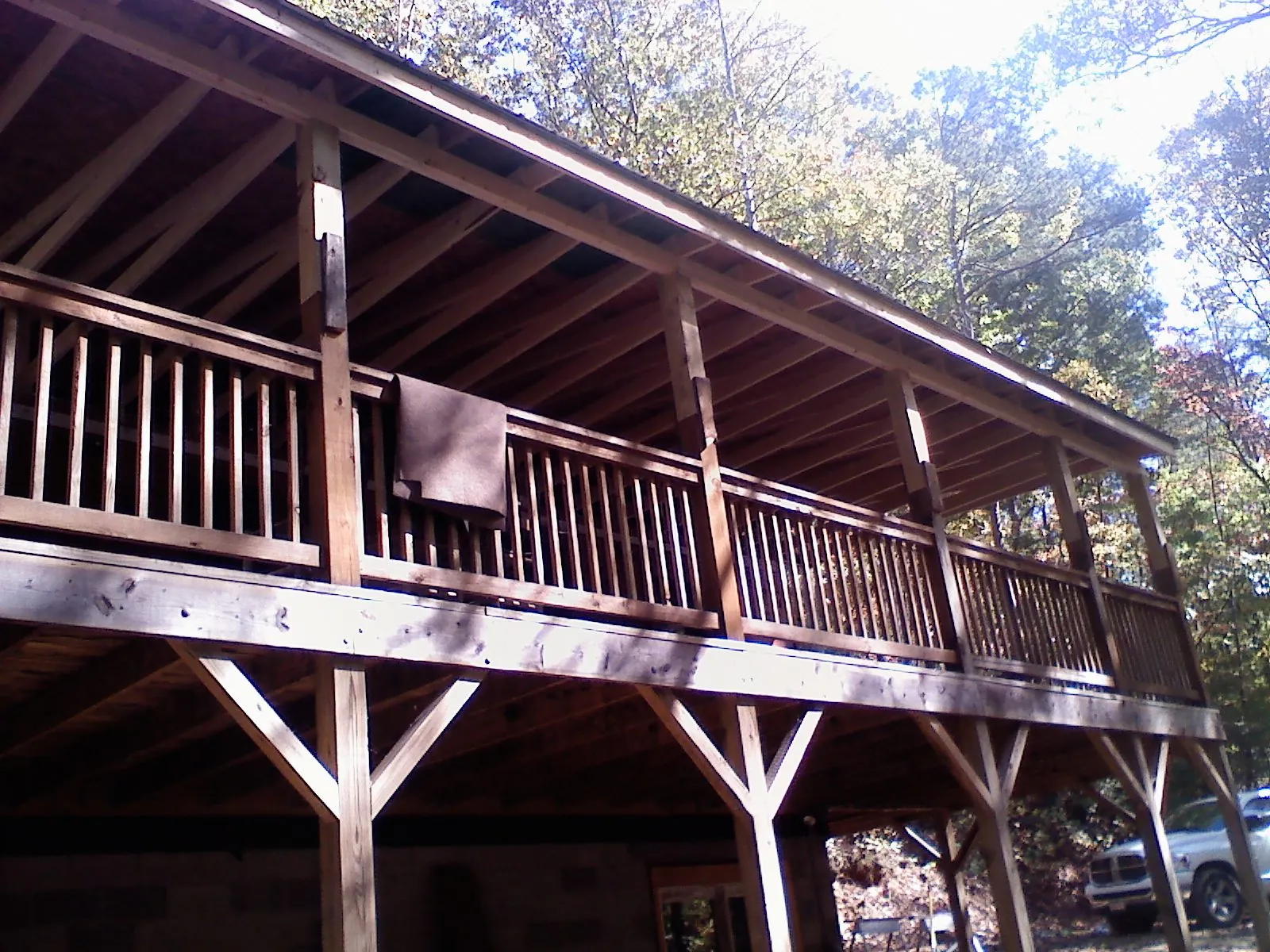 Timber framing under a new elevated porch and deck — Roof Leak Repair in Brooklyn by Roofing Brothers